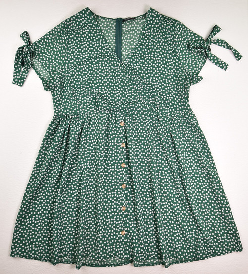 This is a green, floral, silky dress by Shein Curve, size 4XL.