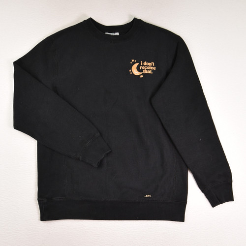 This is a black sweatshirt, size M, with i don't receive that on the front.