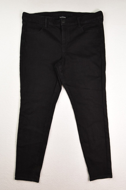 This is a pair of black denim American Eagle women's jeans, next level stretch, size 18.
