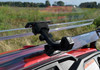 Close-up of the SuperATV flip out windshield latch on the Honda Pioneer 500 hood edge
