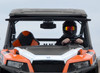 Straight-on front view of the orange Polaris General with the SuperATV windshield closed and driver in a helmet