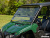 Front three-quarter view of the green Yamaha Viking with the SuperATV flip windshield closed