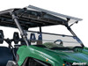 SuperATV flip windshield on a green Yamaha Viking with the upper panel flipped up under the roof, close front view