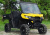 SuperATV vented windshield on a yellow Can-Am Defender with a driver and roof, side three-quarter view