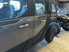 Low angle of a gray Polaris Xpedition with Dirty Teeth Racing billet exterior door handles on both doors