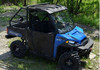 SuperATV plastic roof installed on a blue Polaris Ranger XP with doors, front three-quarter view on a trail