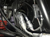 Dirty Teeth Racing 2-way remote start harness connectors plugged in beside the cage of a Polaris General