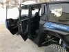 SCM door kit for Polaris Xpedition XP 5 and ADV 5: open upper doors on a blue Polaris Xpedition, side view