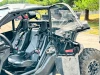 SCM door kit for Can-Am Maverick X3 2-seat: open door with upper panel and vent, cab interior view