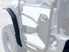 Spike fender flares for Kawasaki Ridge and Ridge Crew: front fender flare on a faded Kawasaki UTV, close-up
