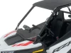 Spike roof and windshield combo for Polaris RZR 200 youth: windshield and roof on a white Polaris RZR, close side view