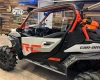 SCM door kit for Can-Am Maverick Sport 2-seat: upper door installed on a gray Can-Am, side view in a shop