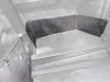SCM block-off and splash panels for Polaris Ranger 500: black block-off panel highlighted under a faded seat base
