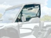 SCM door kit for Kawasaki Ridge: tinted upper door highlighted on a faded white UTV