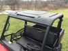 Extreme Metal Products black plastic roof installed on a red Polaris Ranger Mid-Size, elevated side view showing seat and bed