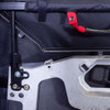 Inside view of the Seizmik upper door hinge post, red pull strap and mounting bracket on a Polaris General