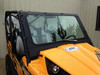 Extreme Metal Products glass windshield installed on a yellow Kawasaki Teryx, front three-quarter view