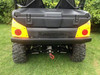 Extreme Metal Products rear bumper on an orange Kawasaki Teryx4, straight-on rear view below the tailgate