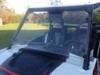 Front view of the Extreme Metal Products full windshield and roof on the white Polaris RZR with hood scoop below