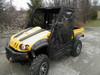 Passenger side front three-quarter view of a yellow Cub Cadet Challenger with 3 Star soft full doors