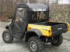 Rear view of the 3 Star cab enclosure rear window and cargo bed on the yellow Cub Cadet Challenger