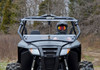 Straight-on front view of the Arctic Cat Wildcat Trail with the SuperATV windshield upper half tilted open above the hood