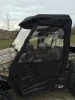 Side view of the Side X Side enclosure door with zip-open clear window and roof panel on a camo Hisun UTV