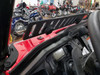 Close-up of the Spike Powersports windshield vent slots from inside a red Honda Pioneer 1000