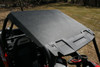 Spike Powersports black hard roof installed on a red Polaris RZR, viewed from above the cab