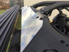 Driver side close-up of the windshield edge and top clamp on the Can Am Maverick X3 cage