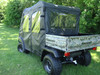 3 Star cab enclosure on a camo Kawasaki Mule 4010 Trans seen from the rear passenger side, clear side and rear windows
