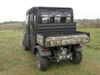 Rear view of the 3 Star cab enclosure rear window on a camo Kubota RTV1140 with the dump bed behind