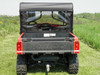 Rear view of a red Kymco 500i with the 3 Star full cab enclosure, clear rear window above the dump bed