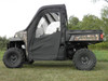 Side profile of the camo Polaris Ranger XP 900 with the 3 Star full cab enclosure and doors closed