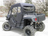 Rear three-quarter view of the 3 Star cab enclosure and rear window on the white Yamaha Wolverine