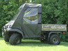 3 Star full cab enclosure with vinyl windshield on a camo Kawasaki Mule 3000/3010, side view on grass