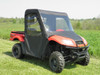 Red Kymco 500 with the 3 Star full cab enclosure soft doors and vinyl windshield installed, side view on grass