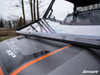 Close-up of the SuperATV flip-down windshield lower seal on the hood of a Polaris side-by-side, upper panel tilted