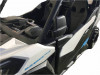 Side view of a white Can-Am Maverick Trail showing the Extreme Metal Products folding mirror position by the door