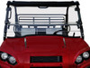 Spike Powersports full-tilting windshield installed on a red Kawasaki Mule Pro-FXR, straight-on front view in a studio