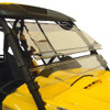 Front three-quarter view of the yellow Can-Am Commander with the Spike Powersports windshield vented open
