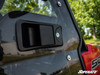 Close-up of the black exterior handle on the SuperATV Ranger Midsize cab door with the glass above