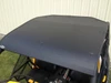 Elevated rear view of the Extreme Metal Products one-piece aluminum top covering the yellow Maverick cab
