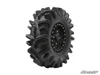SuperATV Terminator mud tire on a black beadlock wheel, side view showing deep V-shaped tread lugs