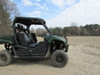 Wide side view of a green Yamaha Viking VI parked on sand with the Seizmik hood rack installed