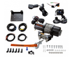 Kolpin winch kit contents laid out: winch, mount plate, wiring, switch, contactor and hardware