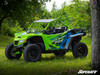Front three-quarter view of the green Textron Wildcat XX in the woods with the SuperATV half windshield
