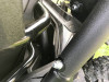 Close-up of the Extreme Metal Products cab back clamp bracket with knob on the Yamaha Wolverine X2 cage bar