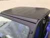 Extreme Metal Products black aluminum top installed on a blue Yamaha YXZ with windshield, front three-quarter close view