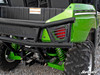 Close-up of the SuperATV rear bumper tube wrapping around the taillight of the green Kawasaki Teryx 4